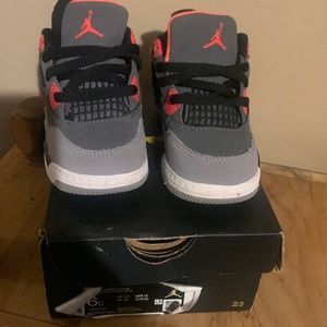 Grey red black Jordan size. 6 toddler
